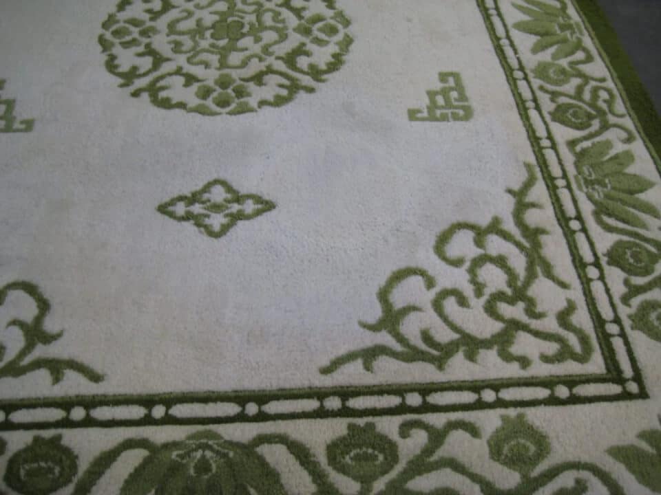 After professional rug stain removal - clean and restored rug fibers with the stain fully lifted