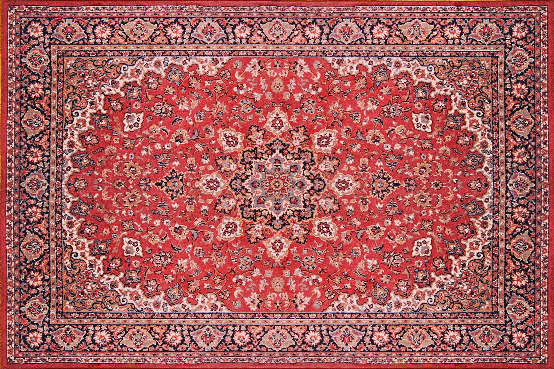 Authentic Persian area rug with intricate geometric patterns requiring professional cleaning to preserve delicate wool fibers and natural dyes
