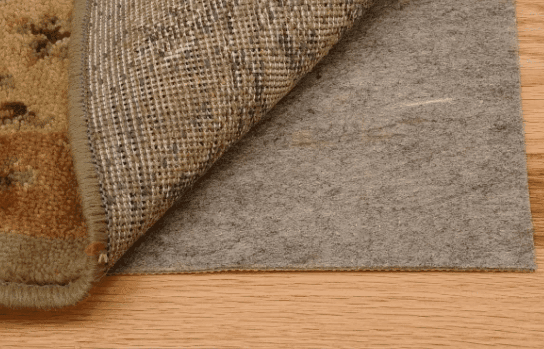 Low Profile All Surface Slide Stop rug pad with 14 oz fiber weight - eco-friendly recycled materials for slim non-slip floor protection