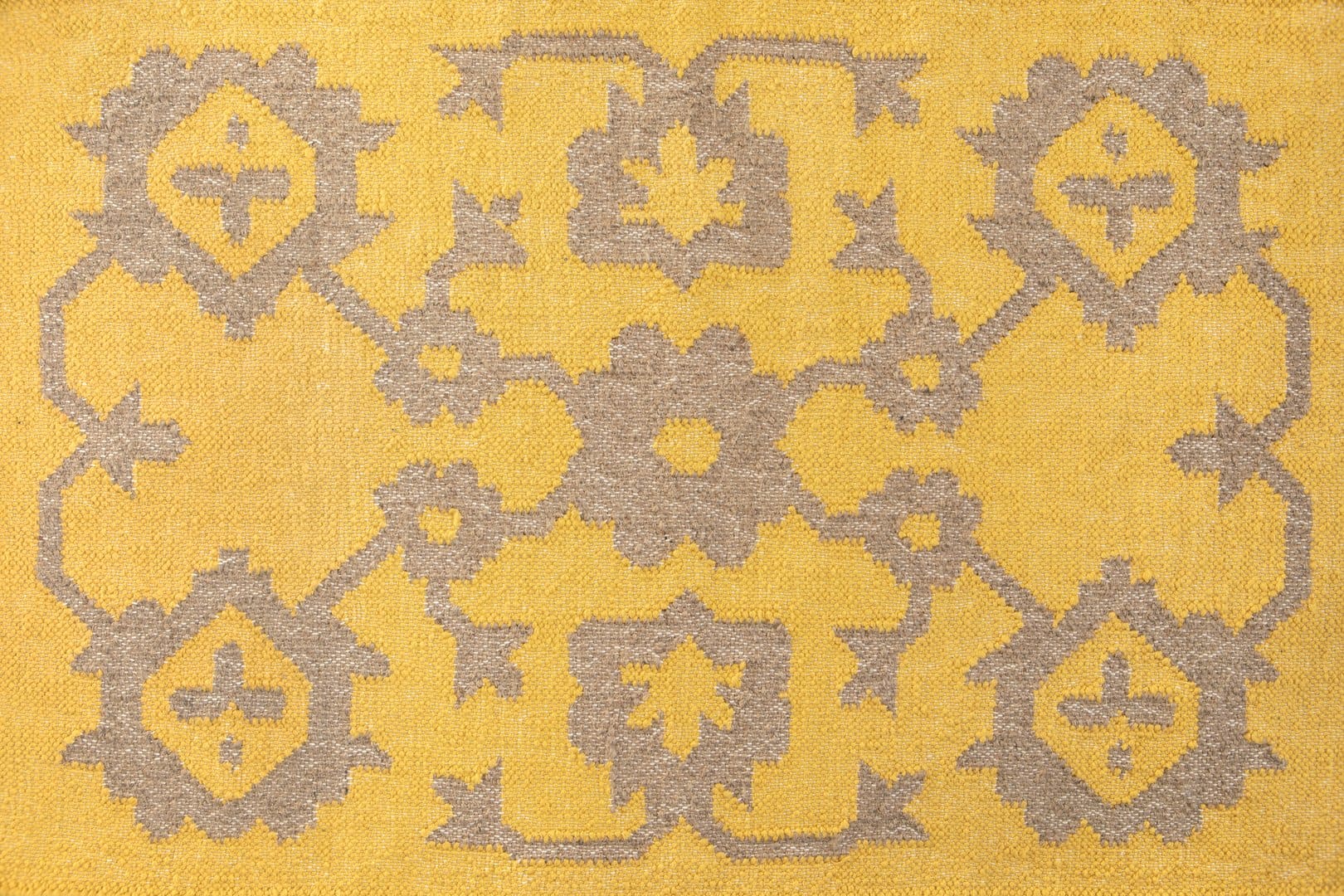 Yellow textile with abstract ethnic pattern. Boho style folk fabric, rug pattern.